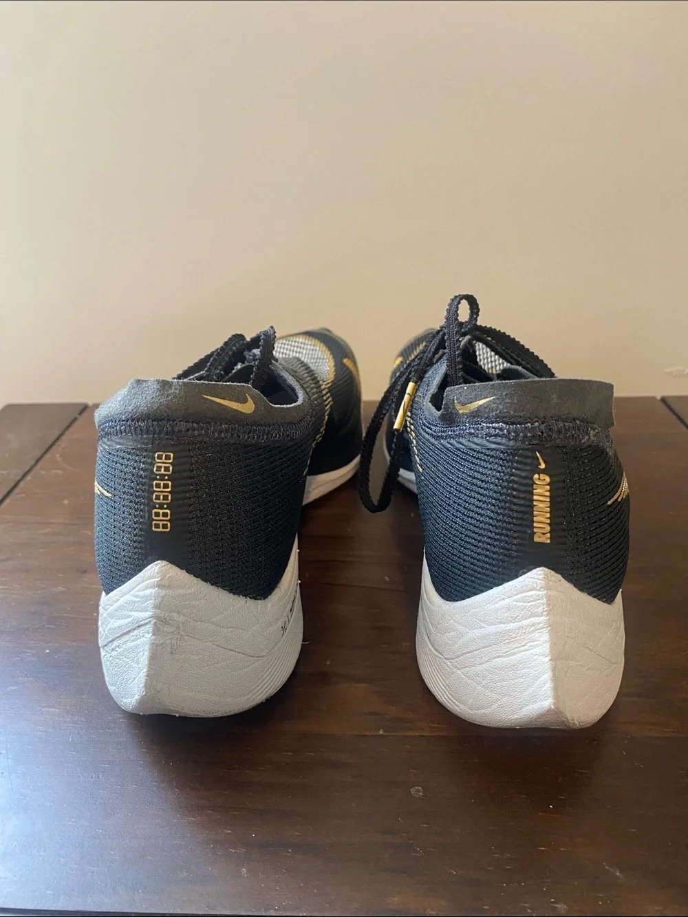 Nike Black and Gold Performance Running Shoes
